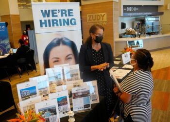 US unemployment sinks to 3.9% as many more people find jobs