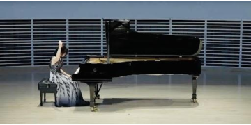 Breakout Pianist and Designer I-Lin Tsai is making the music of JJ Lin classy