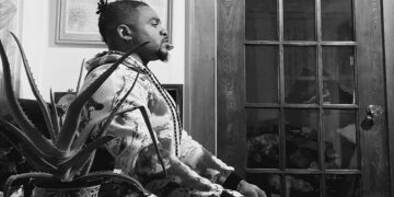 TESTAMENT TO STRENGTH AND FAITH SWIMMING WITH SHARKS