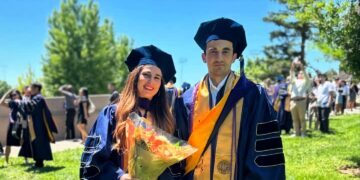 Sukhrobjon Safoev is standing in the university